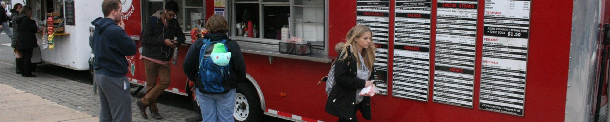 people at a food truck